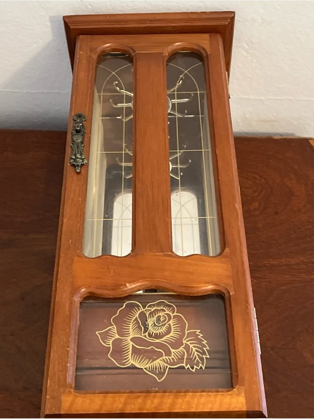 Vintage Tall Wooden Jewelry Armoire with Glass Front and Rose Detail